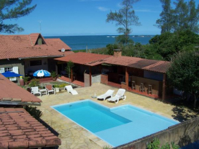 Casa de seis suites na beira do mar